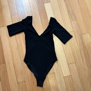 H&M body. Suit. Color black. Size XS
